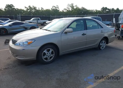 2003 Toyota Camry Le z USA, uszkodzony, nr VIN 4T1BE30K43U743251